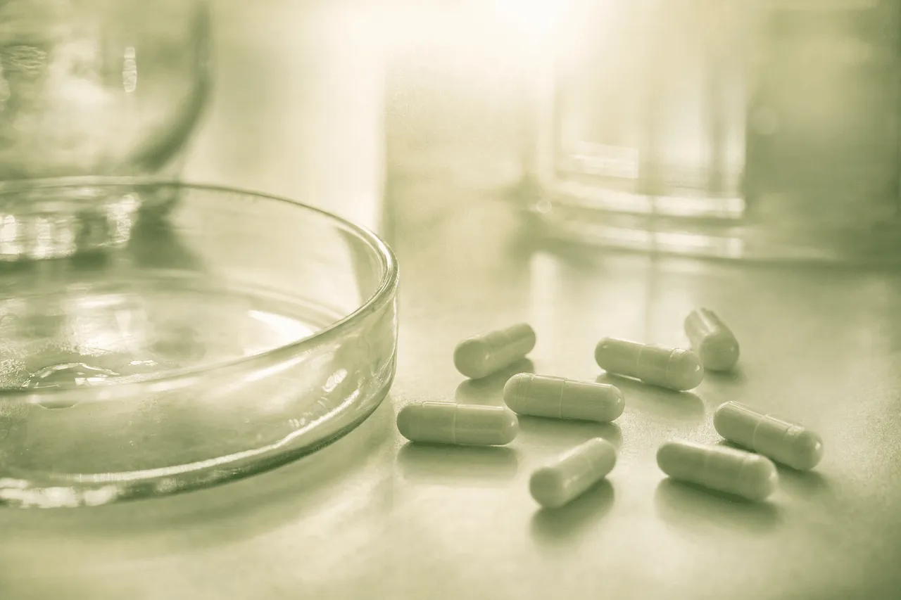 Unmarked capsules on a laboratory surface